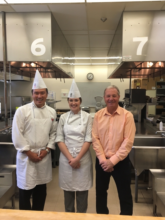 SAIT’S VICTORIA HISLOP DEMONSTRATES HER WORLD CLASS COOKING SKILLS TO M.P. RON LIEPERT PRIOR TO WORLDSKILLS ABU DHABI 2017 DEPARTURE